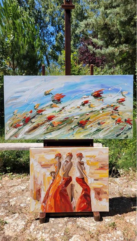 Tableau paysage de fleurs des champs en mouvement peint au couteau et au pinceau par Sylvie Adaoust, vue d’ensemble sur chevalet en extérieur